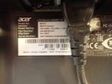 a label on the back of a laptop that says acer
