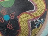a picture of a decorative vase with a dragon painted on it