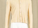 mannequin dressed mannequin wearing a yellow shirt and white pants