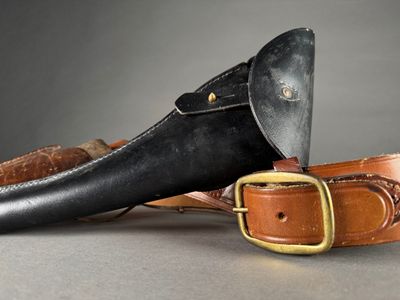 a pair of shoes and a knife on a table
