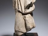 a statue of a woman with a veil on her head