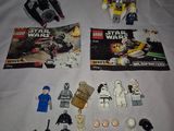 lego star wars minifigurs sit on a bed with a magazine