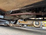 a close up view of a car underneath a vehicle