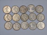 a close up of a bunch of coins sitting on top of a table