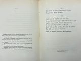 an open book with a picture of a cat on it