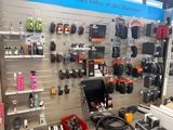 a display of cell phones and other electronics in a store