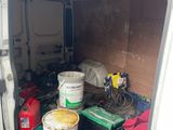 a white van that has a lot of stuff in it
