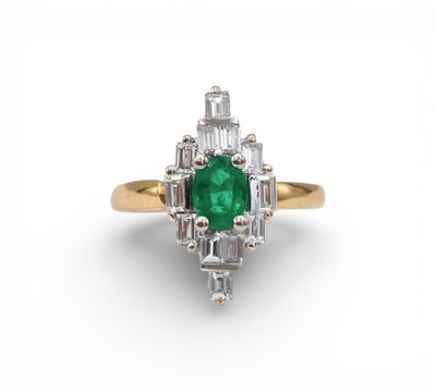 an emerald and diamond ring