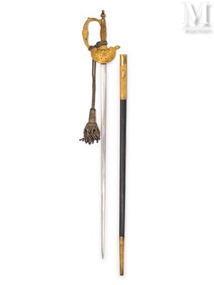 an image of a sword with a gold handle and a black handle