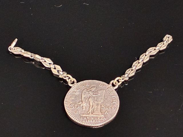 Une pièce d’argent Louis XVI 30 sols, dit Génie l’an 4, atelier A...