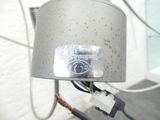 a close up of a metal object on a wire