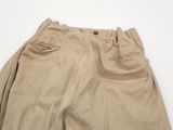 the back of a pair of khaki pants on a white surface