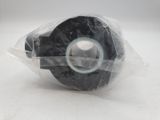 a roll of tape wrapped in plastic on a white surface