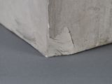 a close up of a piece of concrete on the ground