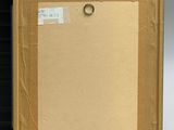 an image of a painting in a box with a tag on it