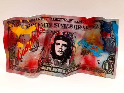 une photo d'un billet d'un dollar sur lequel figure le portrait de Che Guevara