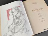 a book with a drawing of a man in a suit
