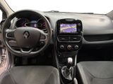 a picture of a car dashboard with a steering wheel and dashboard controls