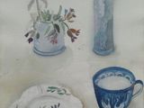 a painting of flowers in a vase and a plate on a table