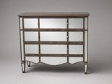 a wooden and metal dresser with mirrored shelves and drawers