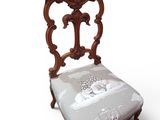 une image représentant une chaise sur laquelle est posé un coussin
