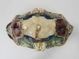 a small decorative object on a white surface