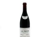 a bottle of wine that is sitting on a table