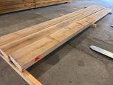a wooden bench that is sitting in the middle of a room