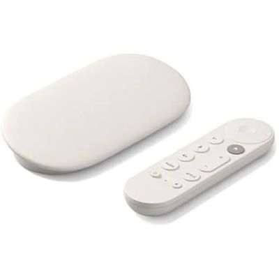 a remote control sitting next to a white object