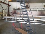 a picture of a metal ladder in a warehouse