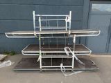 a metal shelf that has a bunch of shelves on it