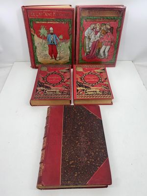 three books are sitting on a white surface, one is red and the other is black