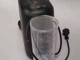 a blender that has a glass in it