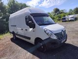 a white van that is parked on the side of the road