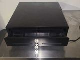 an image of a metal counter top with a drawer in it