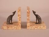 pair of art deco bookends of a cat and a dog