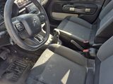 the interior of a car with a steering wheel and a dashboard