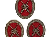 trois boutons métalliques à fond rouge portant deux épées