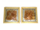 two pieces of tin foil on top of each other
