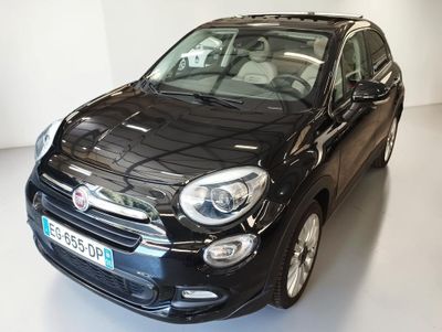 the small black car is parked in a white room