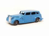 a blue toy car that is sitting on a white surface