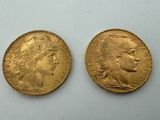 two gold sovereigns, one of which has a bust and the other of which is a bust