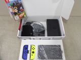a box with a nintendo switch and a nintendo game controller
