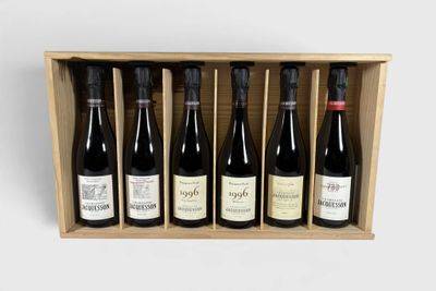 six bottles of wine in a wooden box