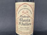 a bottle of wine that is sitting on a table