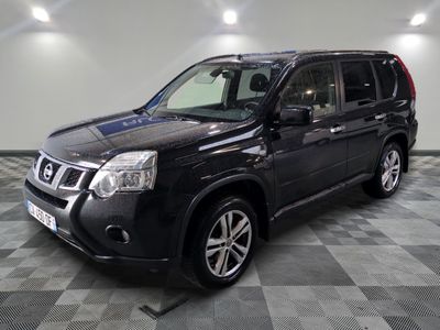 the black nissan pathfinder is parked on a checkered floor