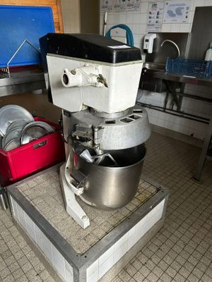 an image of a kitchen with a mixer on a table