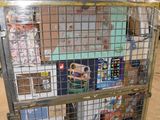 a metal cage with a bunch of items in it