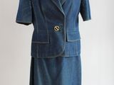 une photo d'une robe et d'une veste sur un mannequin