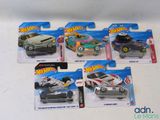five hot wheels cars in each of them on display